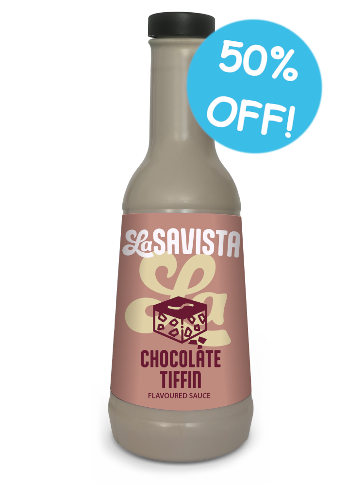 A bottle of Savista Chocolate Tiffin Flavoured Sauce on a white background with a blue '50% OFF!' promotional badge. The bottle contains a light brown sauce and has a pink label with a dark brown chocolate graphic.