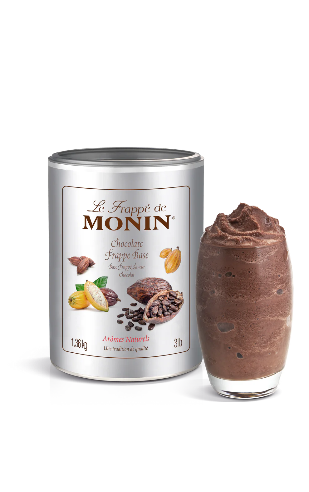 A canister of Monin Chocolate Frappe Mix next to a glass of the prepared beverage, showcasing the product's use in creating a chocolate frappe.