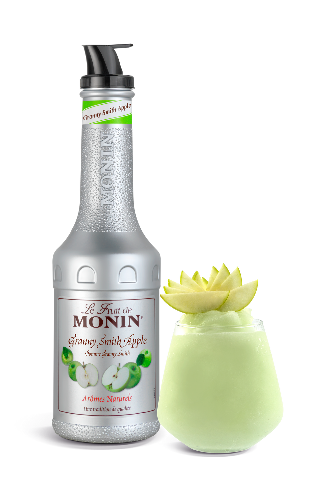 Monin Granny Smith Apple syrup bottle with a decorative apple on a white background