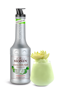 Monin Granny Smith Apple syrup bottle with a decorative apple on a white background