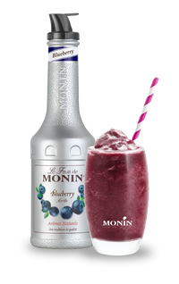 Monin blueberry syrup bottle and a blueberry smoothie on a white background