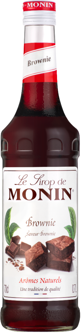 A bottle of Monin Chocolate Brownie Syrup with a label showing the product name and an image of a brownie with nuts on top.