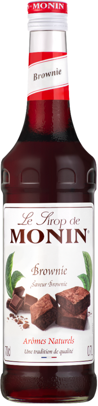 A bottle of Monin Chocolate Brownie Syrup with a label showing the product name and an image of a brownie with nuts on top.