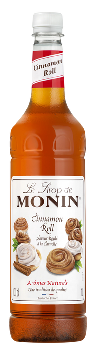 Bottle of Monin Cinnamon Roll syrup with label