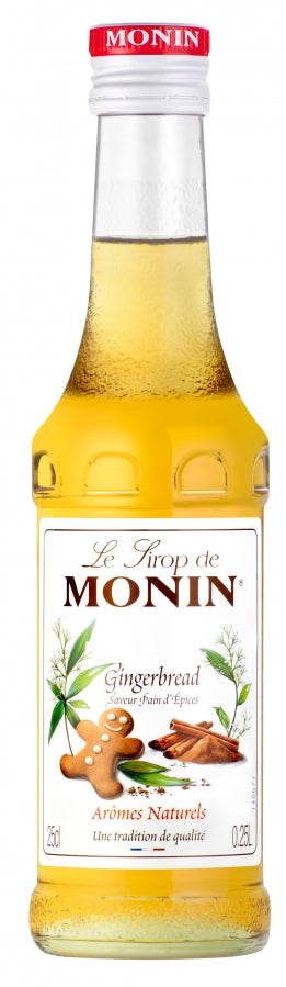 A bottle of Monin Gingerbread Syrup, 25cl, with holiday-themed packaging featuring gingerbread cookies.