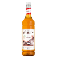 A bottle of Monin Nut Free Hazelnut Syrup, 1 litre.