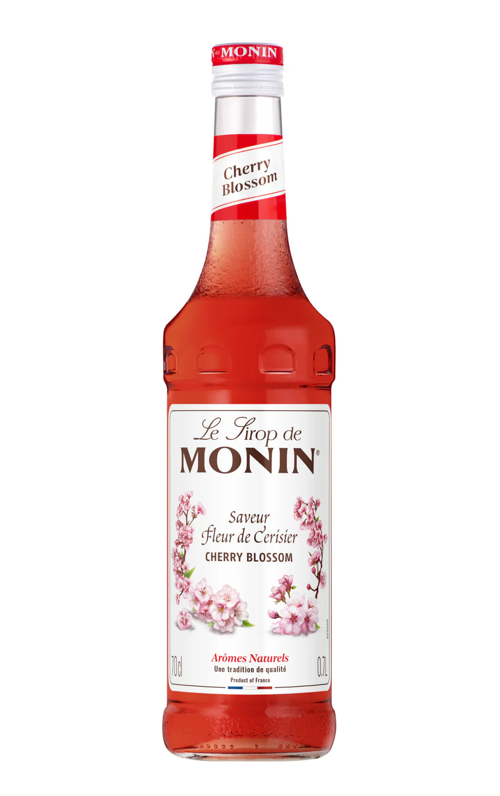 Monin Cherry Blossom syrup 70cl glass bottle with pink floral label, product photography for cocktail syrups