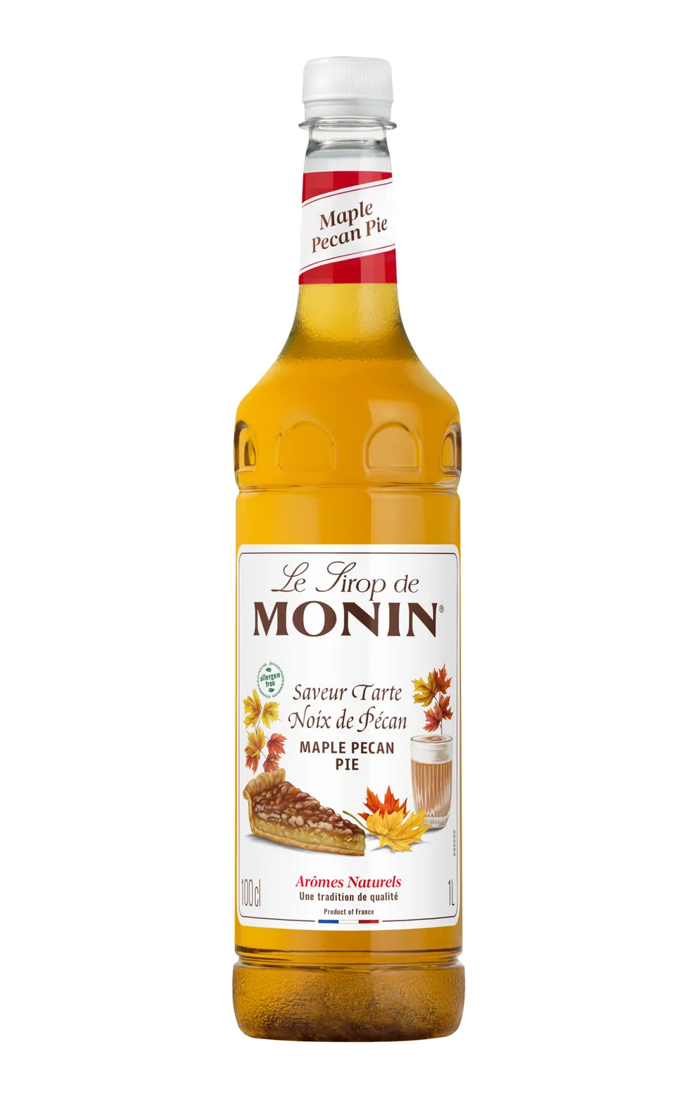 A bottle of Monin maple pecan pie syrup against a plain white background. The clear plastic bottle shows the golden-amber liquid inside, with a white cap and a detailed white label featuring autumn-themed illustrations and the brand name 'Monin'.