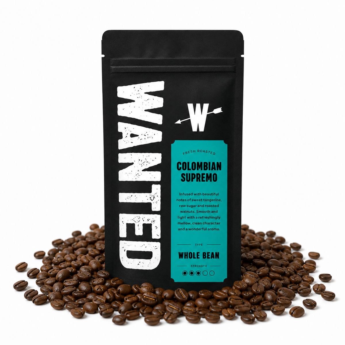 A black stand-up coffee bag labeled WANTED Colombian Supremo whole bean coffee, standing upright on a white background with roasted coffee beans scattered around its base.