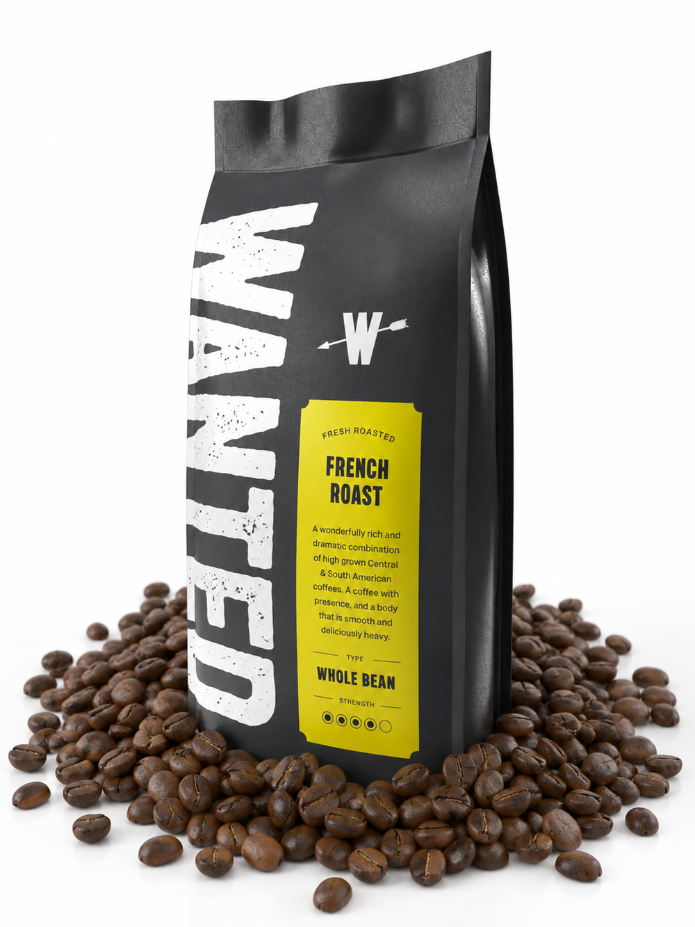 A black bag of WANTED French Roast whole bean coffee stands upright on a white background, surrounded by scattered roasted coffee beans. The bag features a large distressed white 'WANTED' logo and a bright yellow label with black text.