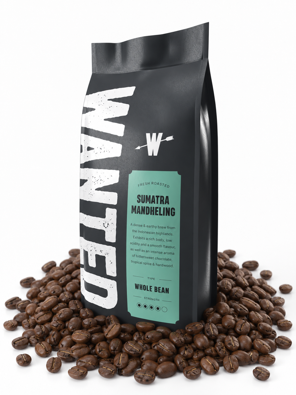 A matte black coffee bag labeled 'WANTED' with a mint green label reading 'Sumatra Mandheling' and 'Whole Bean', standing upright on a white background with roasted coffee beans scattered around its base.