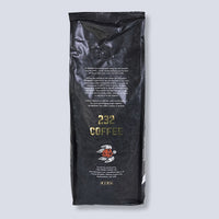 Back of the Guinness 232 Coffee Beans 1kg bag with the Tiki Tonga logo