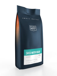 A package of Swiss Water Decaf whole bean coffee, 1kg, in a navy and orange branded bag.