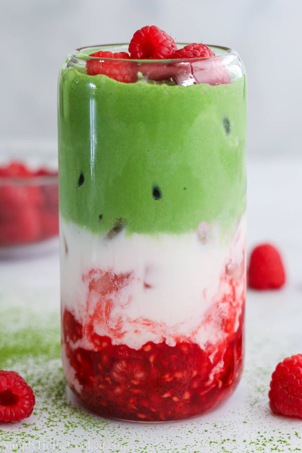 Raspberry and white chocolate matcha bundle with premium matcha powder, preparation tools, and easy at-home recipe guide.