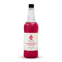 A bottle of Simply Dragon Fruit & Mango Cooler syrup with a black cap and a cream-colored label, filled with a vibrant magenta liquid, set against a plain white background.