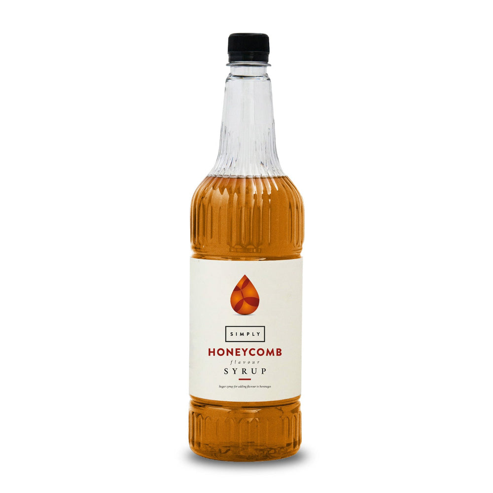 A bottle of Simply Honeycomb Italian Syrup with amber-colored liquid inside a clear glass bottle, featuring a white label with red and black text and a black cap, set against a plain white background.