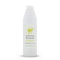 A tall white plastic bottle of Simply Pistachio Flavour Topping Sauce on a clean white background.