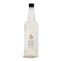 A bottle of Simply Pretzel Flavor Syrup with a white label and black cap, shown on a clean white background.