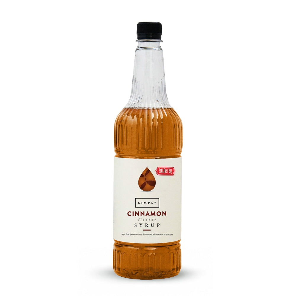 A bottle of Simply Cinnamon Syrup with amber liquid inside a ribbed clear glass bottle, featuring a white label and a black cap, set against a plain white background.