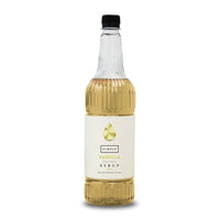 A bottle of Simply Vanilla Flavour Vanilla Syrup with a black cap and a cream-colored label, shown on a white background.