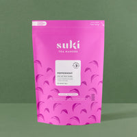 Suki Peppermint Tea loose leaf herbal pyramids 50 pack in a pink compostable pouch