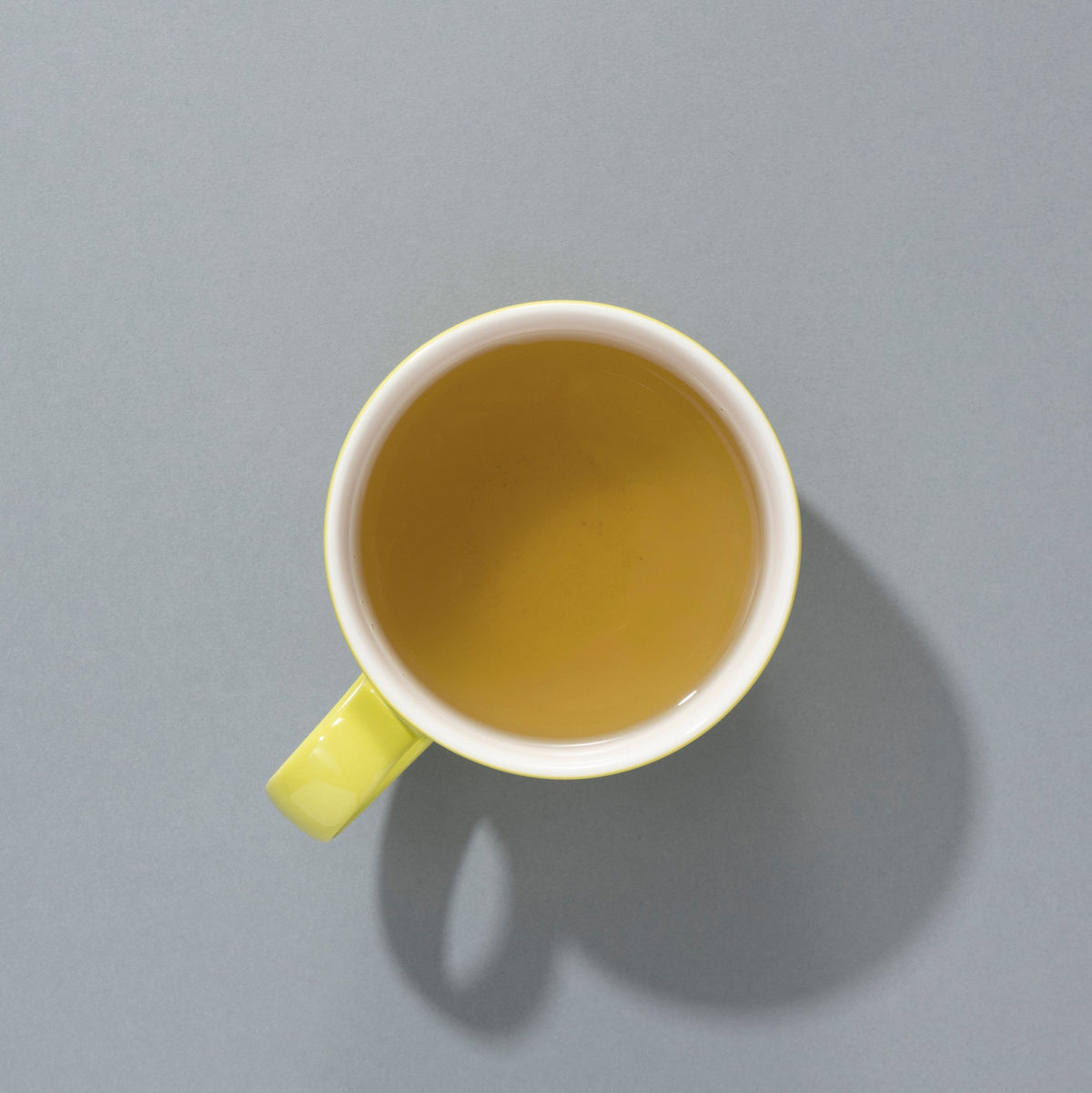 Cup of brewed Suki Organic Sencha green tea